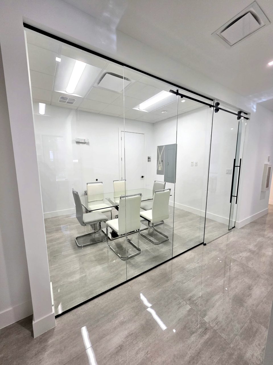 Frameless glass conference room