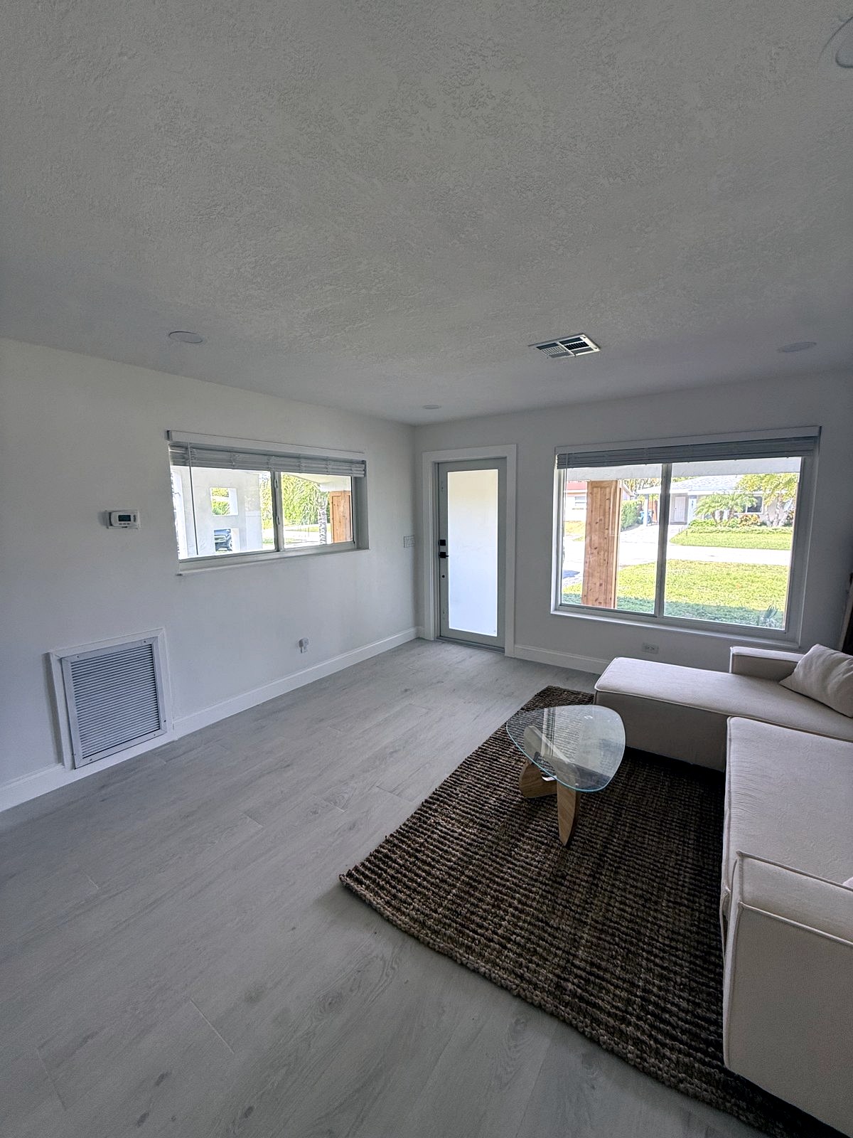 Bright living room with impact windows